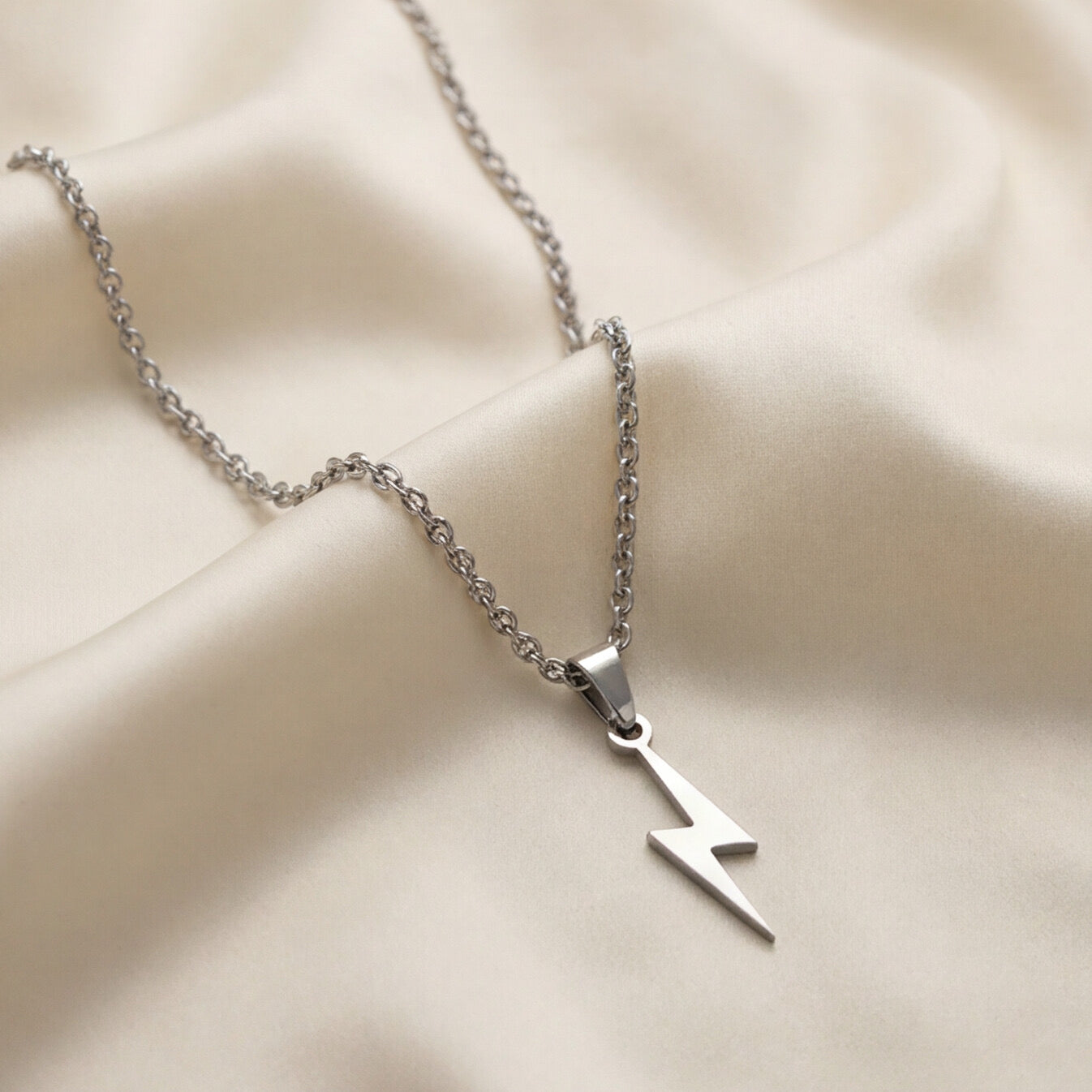 Necklace with lightning bolt pendant