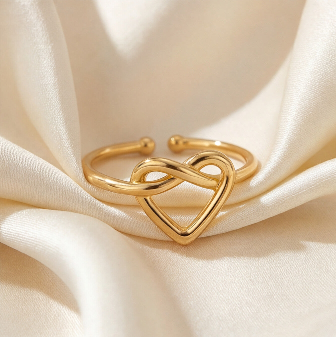 Minimalist twisted heart ring