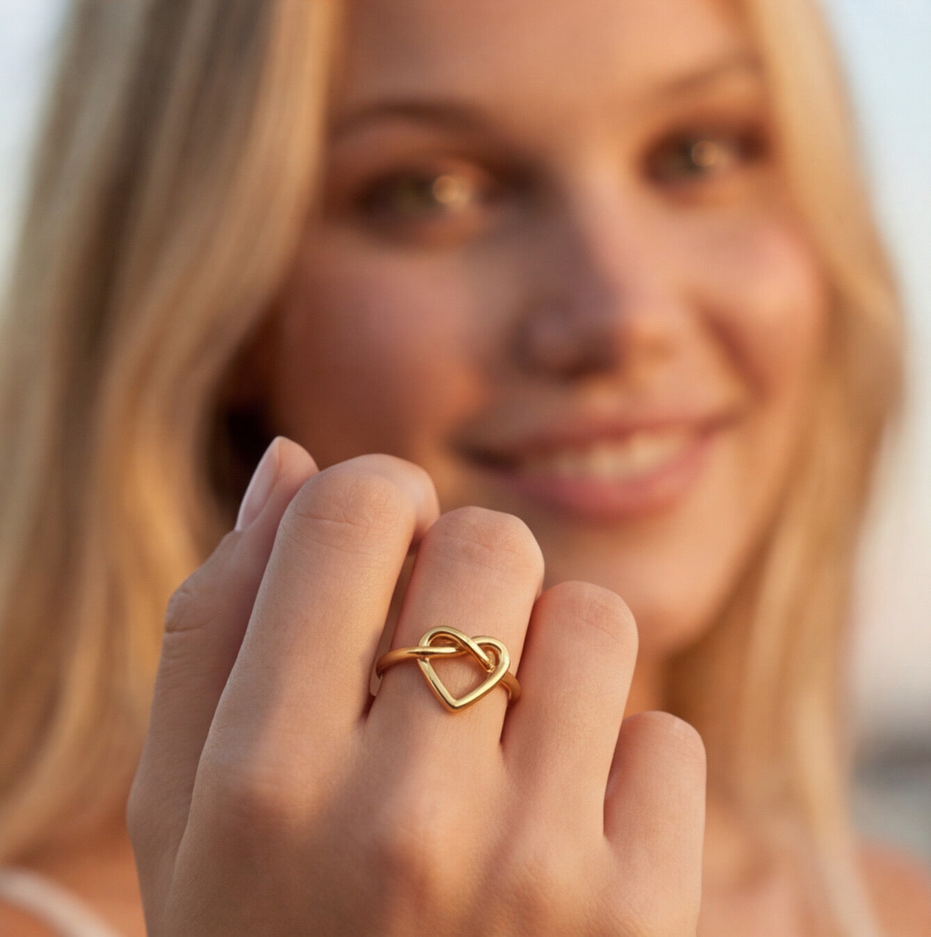 Minimalist twisted heart ring