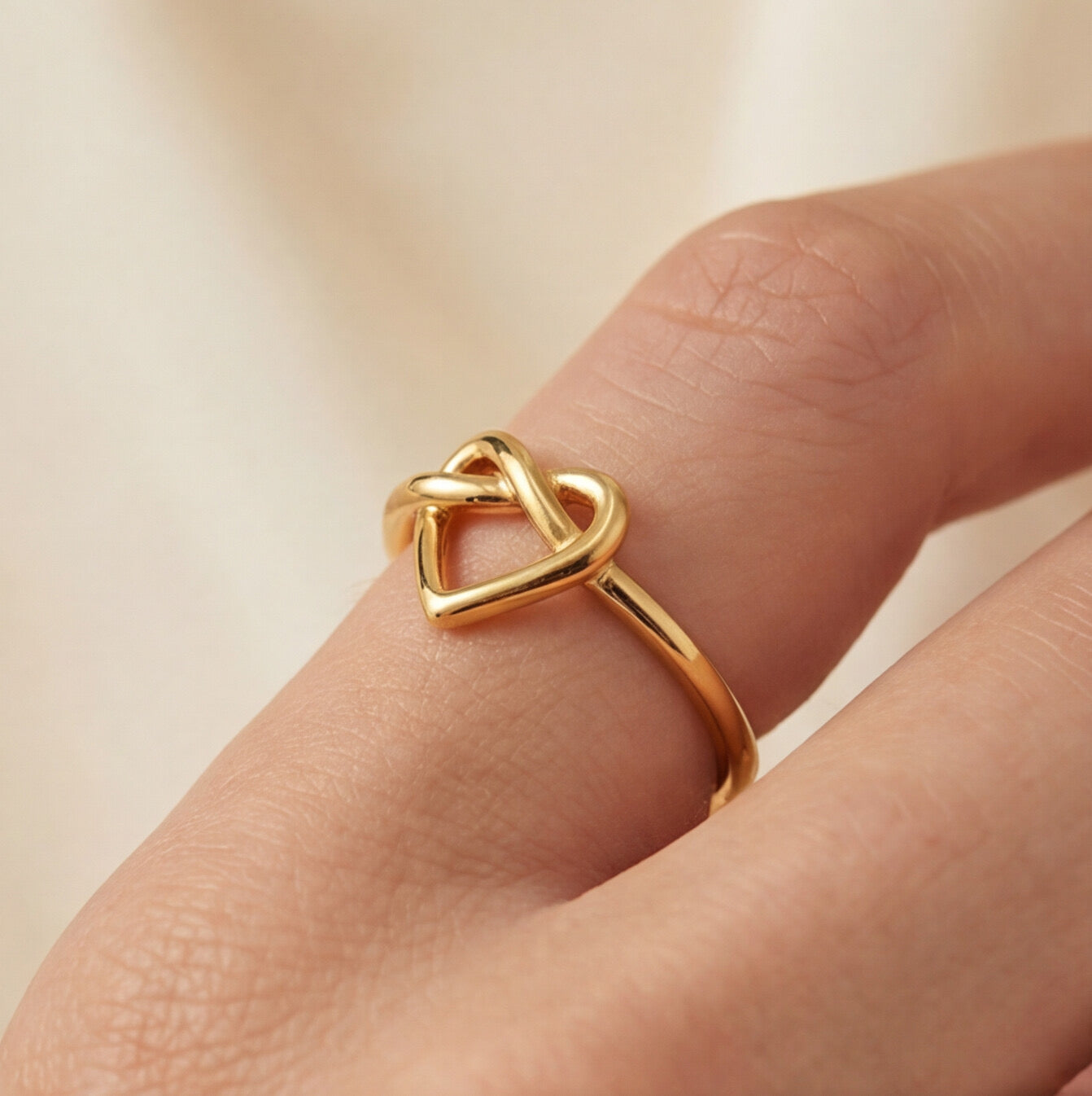 Minimalist twisted heart ring