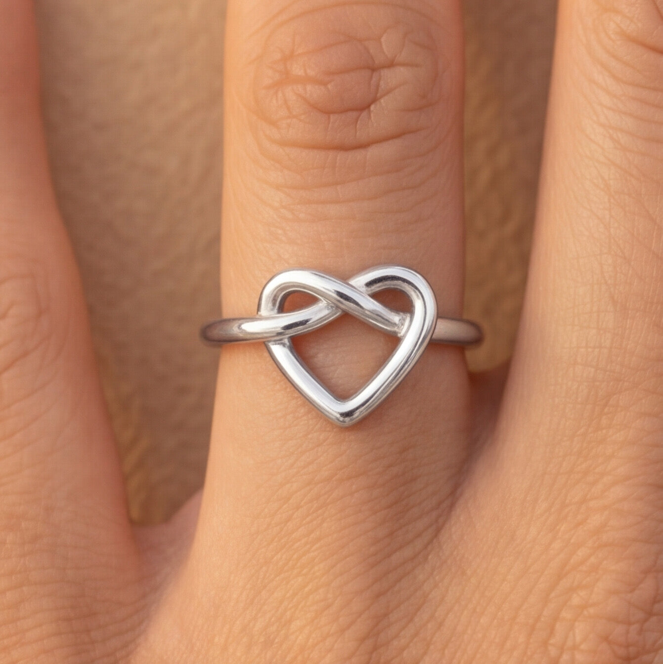 Minimalist twisted heart ring