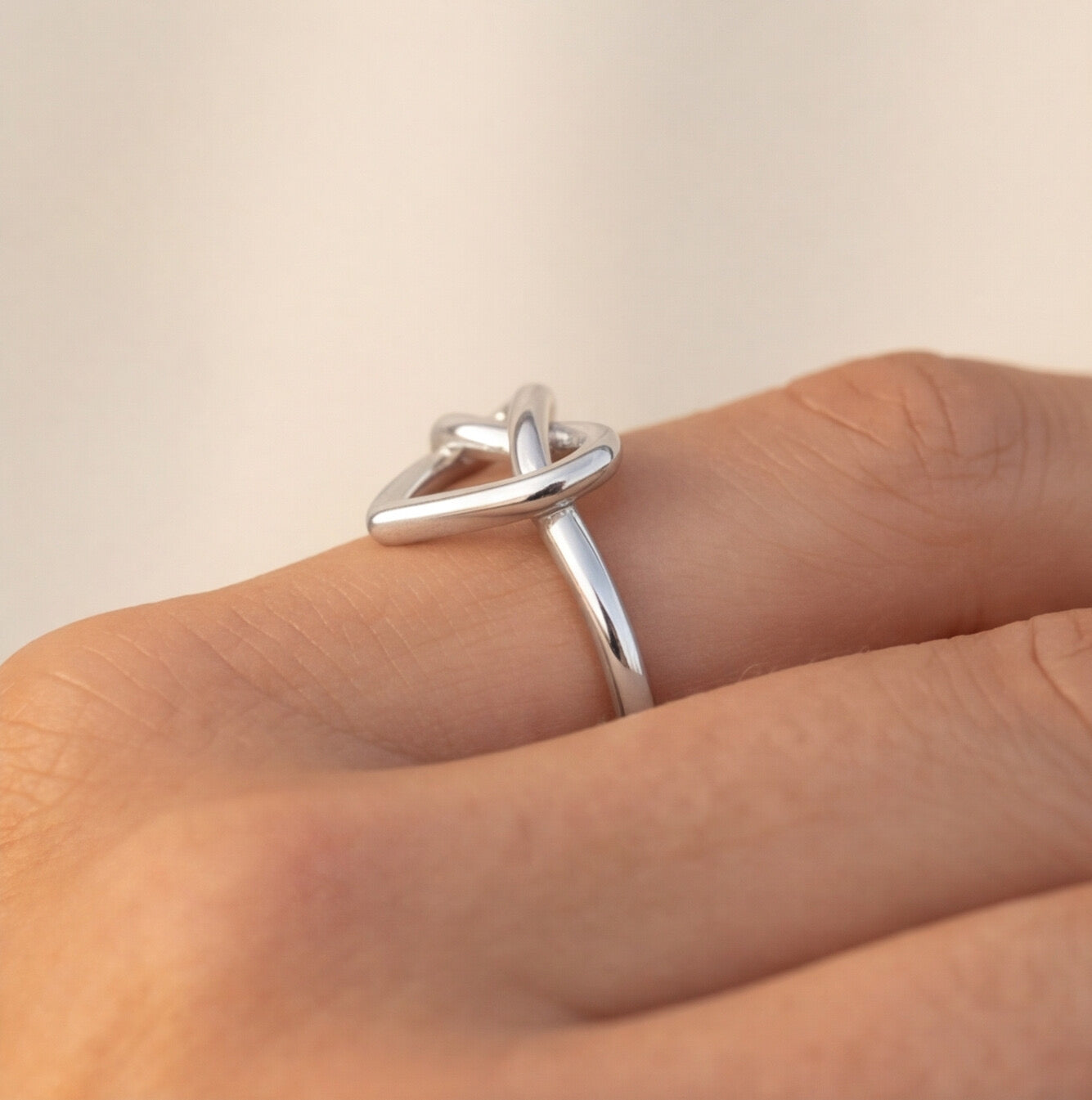 Minimalist twisted heart ring